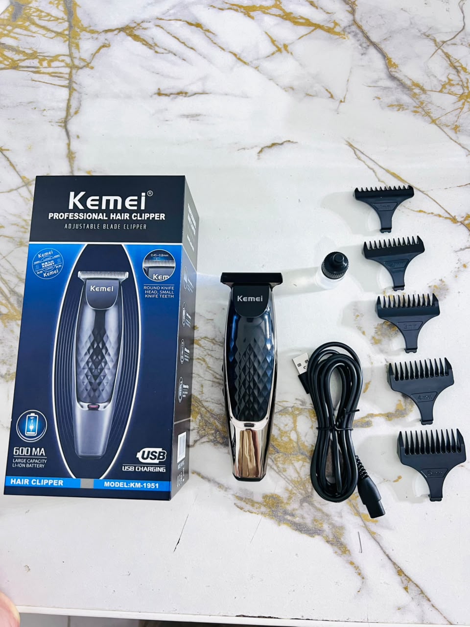 Kemei KM-1835 Professional Hair Clipper – Carbon Steel Blade,with 1mm, 2mm, 3mm, 4mm & 5mm Combs