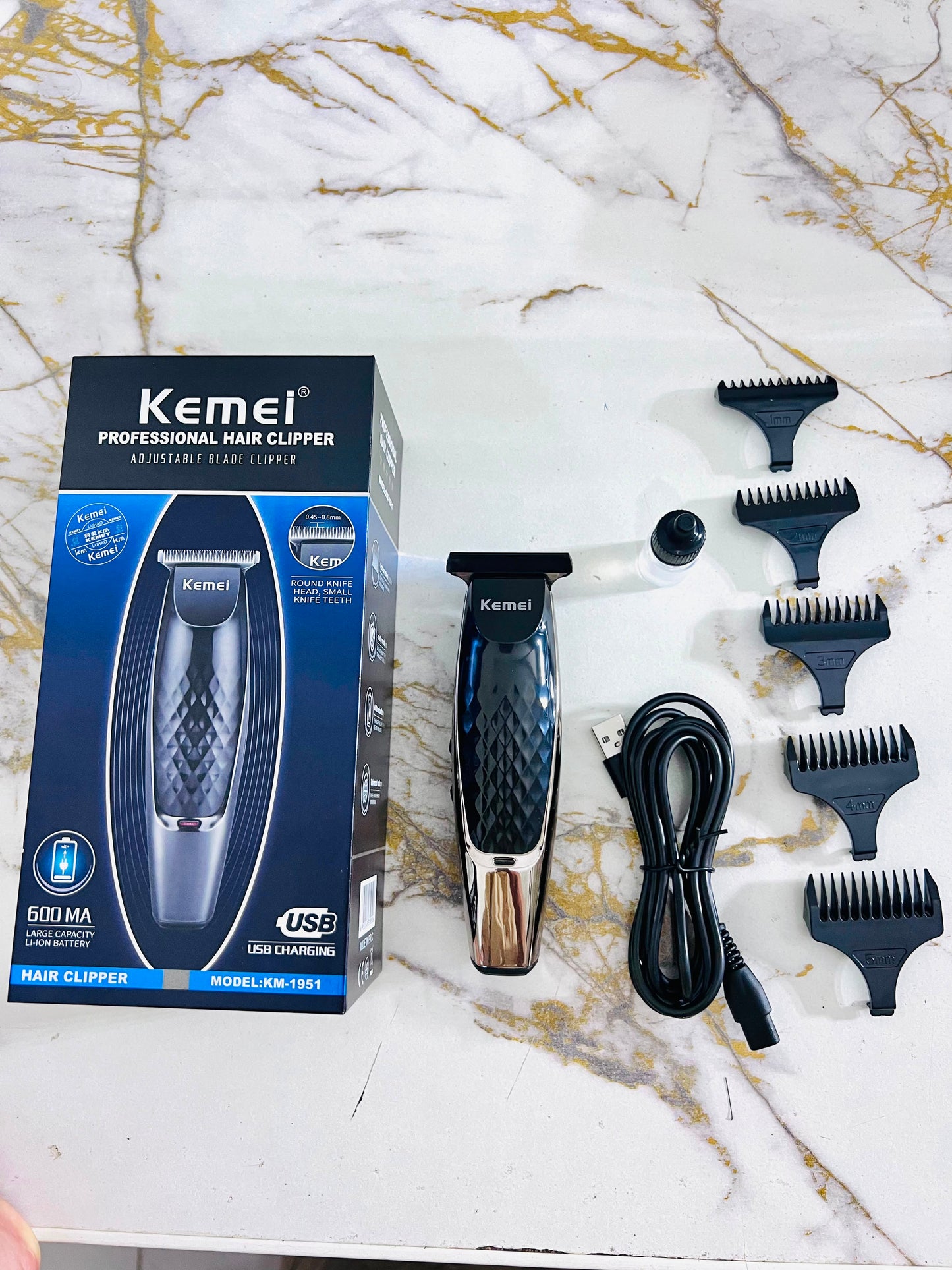 KEMEI LM-1951 Professional Hair Clipper – Carbon Steel Blades with 1, 2, 3, 4 & 5mm Guide Combs