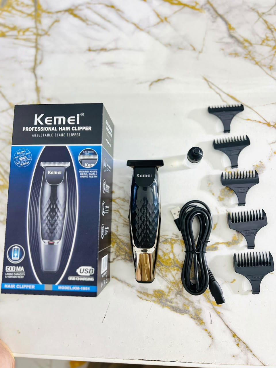 Kemei KM-1835 Professional Hair Clipper – Carbon Steel Blade,with 1mm, 2mm, 3mm, 4mm & 5mm Combs